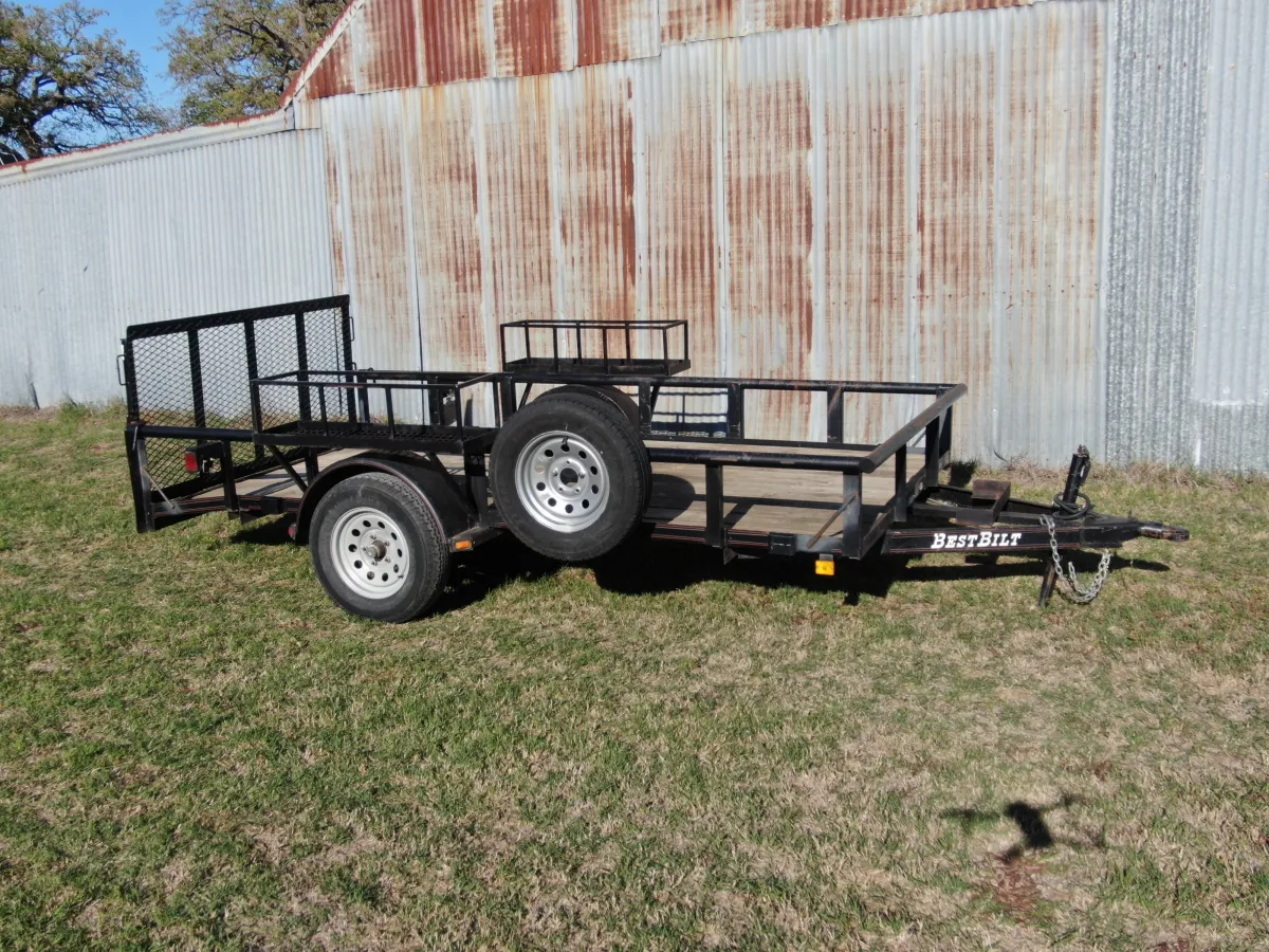 12-foot utility trailer rental Aubrey TX - Compact utility trailer with mesh side rails perfect for small hauling jobs